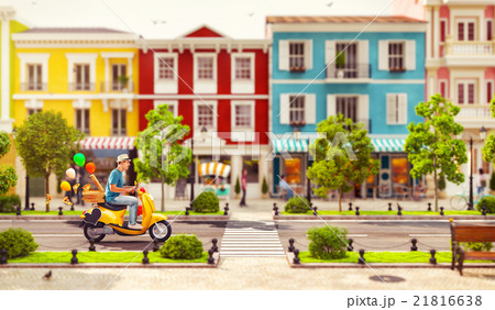 Cheerful man on the cute funny scooter 21816638