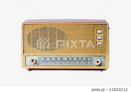 Old dusty radio from 1970 on white background Old dusty radio from 1970 on white background 21820212
