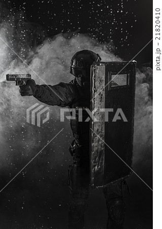police officer with ballistic shield police officer with ballistic shield 21820410