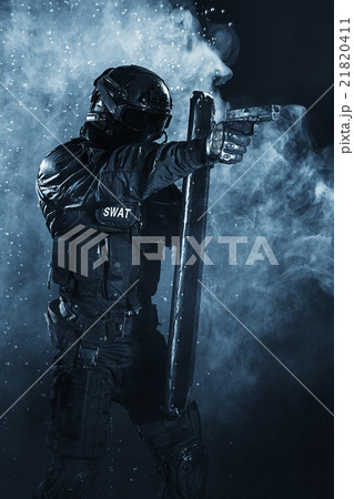 police officer with ballistic shield police officer with ballistic shield 21820411
