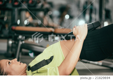 Female athlete training in gym 21820694