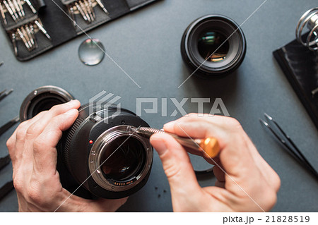 Photo camera lens repair set. Engineer maintenance Photo camera lens repair set. Engineer maintenance 21828519