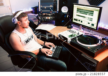 DJ playing piano in the recording studio DJ playing piano in the recording studio 21828557