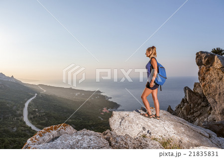 Woman on the peak of mountain Woman on the peak of mountain 21835831