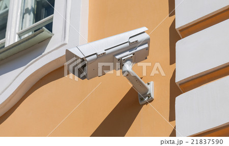 Security or cctv camera on wall background Security or cctv camera on wall background 21837590