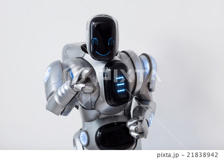 Smiling robot pointing you 21838942