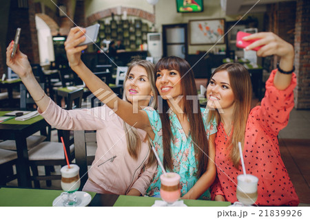 Girls with phones 21839926