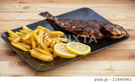 Cooking fish on the grill Cooking fish on the grill 21840961