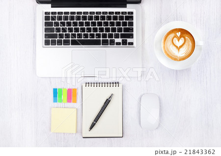 Top view laptop and workspace office  21843362