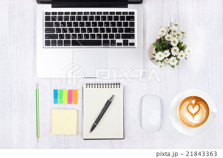 Top view laptop and workspace office  21843363