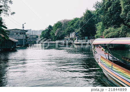 Long tail boat in canal 21844899