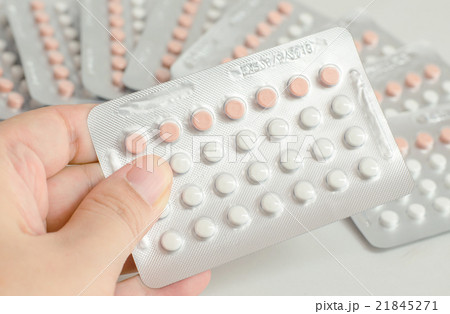 woman hand holding contraceptive pills woman hand holding contraceptive pills 21845271