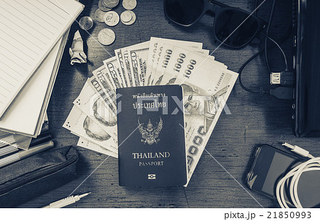 Travel preparation objects on desk, passport, etc. 21850993