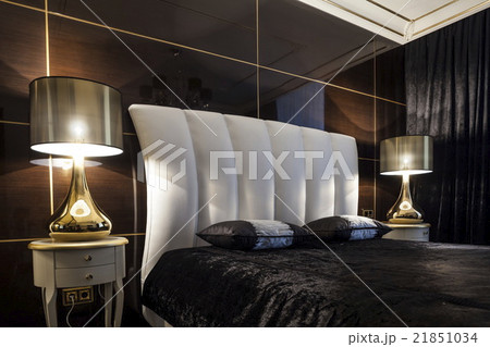 Interior bedroom bed in dark colors Interior bedroom bed in dark colors 21851034