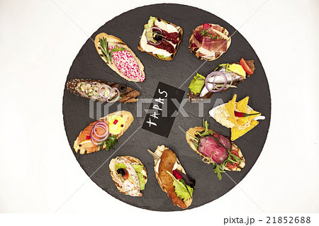 Set of Spanish tapas on the stone plate 21852688