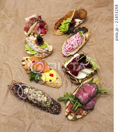 Set of Spanish tapas on the textiles background 21853268