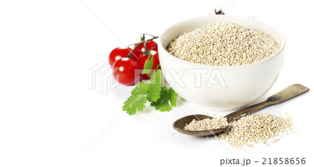 Bowl of healthy white quinoa seeds with vegetables 21858656