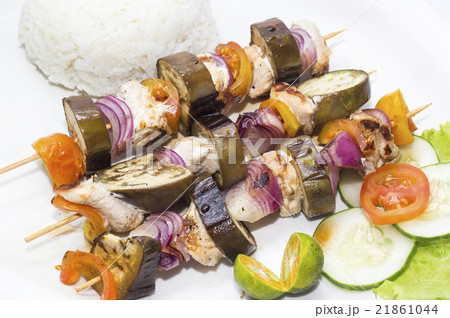 skewers of vegetables and chicken with rice and ve skewers of vegetables and chicken with rice and ve 21861044
