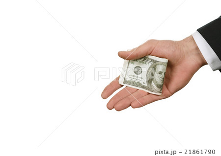 Caucasian businessman's hand with money. 21861790