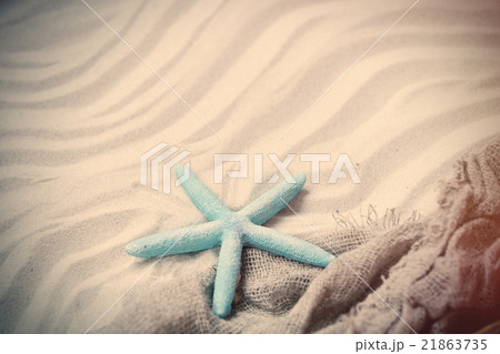 starfish and fishnet on the sand starfish and fishnet on the sand 21863735