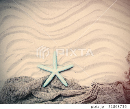 starfish and fishnet on the sand starfish and fishnet on the sand 21863736