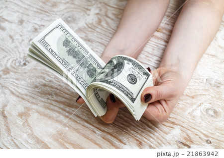 Woman counting money 21863942