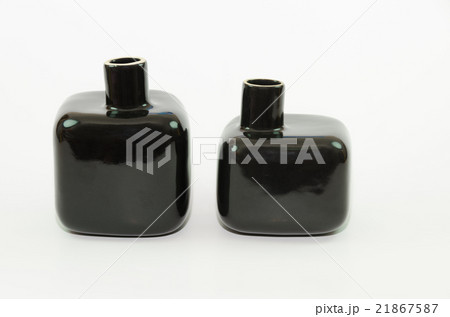 Two black bottles. Two black bottles. 21867587