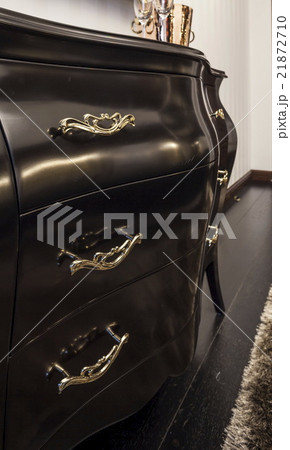 Chest of drawers ebony in interior Chest of drawers ebony in interior 21872710