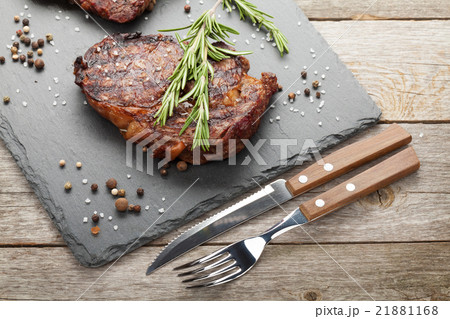 Beef steaks with rosemary and spices 21881168