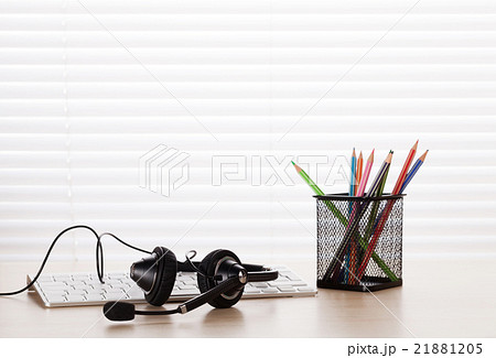 Office desk with headset and pc Office desk with headset and pc 21881205