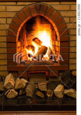 wood and fire in fireplace 21882986
