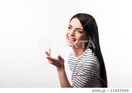 Cheerful girl standing isolated on white 21883560