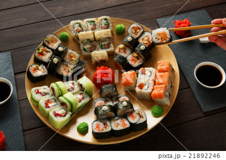 Set of sushi maki and rolls at black rustic wood. 21892246