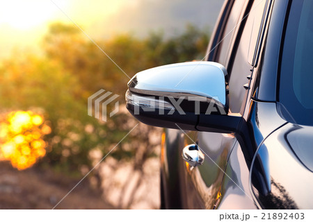 Black car side mirror with sun light effect 21892403