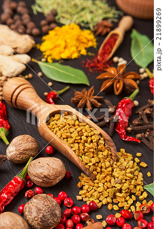 still life with different spices and herbs 21899269