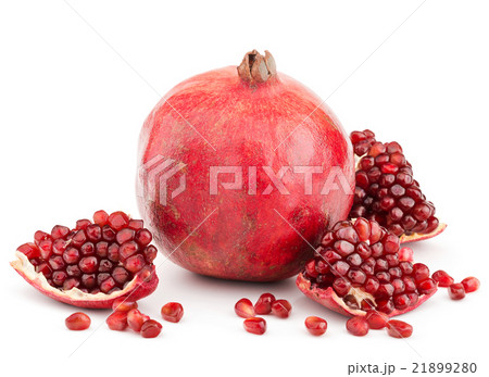 pomegranate with pieces and grains isolated pomegranate with pieces and grains isolated 21899280