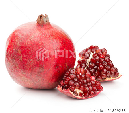 pomegranate with pieces and grains isolated pomegranate with pieces and grains isolated 21899283