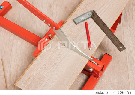 Red tool for cutting laminate 21906355