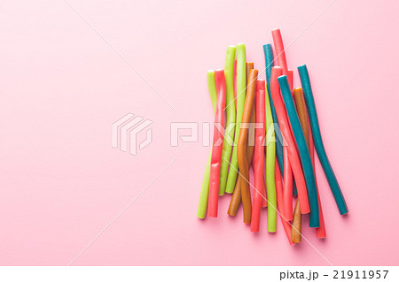 Sweet gummy sticks with different flavor. 21911957
