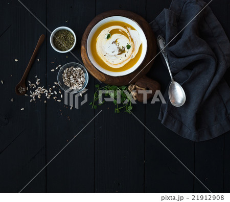 Pumpkin soup with cream, seeds and spices in 21912908