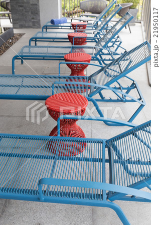 blue bed beside swimming pool blue bed beside swimming pool 21950117