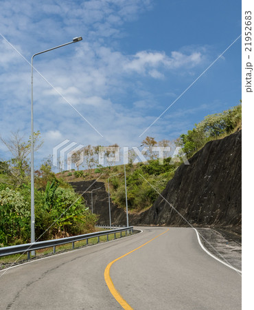 Asphalt curve road with lighting pole Asphalt curve road with lighting pole 21952683