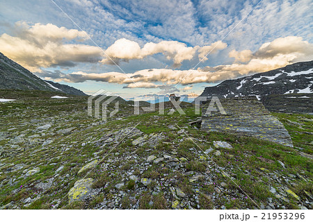 Glowing alpine valley at sunset from above Glowing alpine valley at sunset from above 21953296