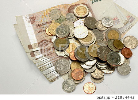 1000 Thai banknote and Thai coins on white 1000 Thai banknote and Thai coins on white 21954443