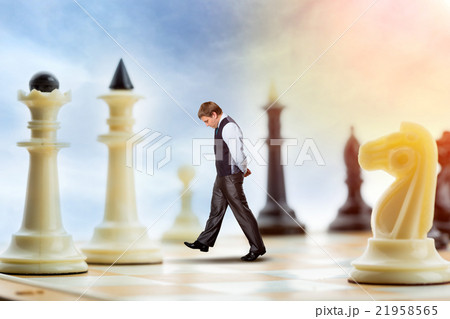 Businessman on the chess board 21958565