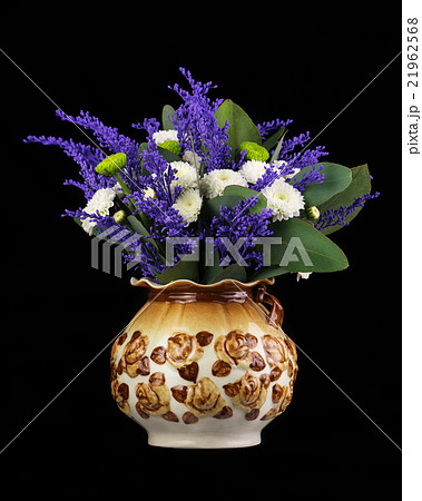 Beautiful bouquet in vase on black background. Beautiful bouquet in vase on black background. 21962568