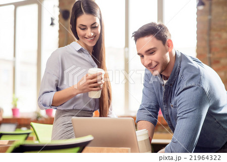 Nice colleagues resting in the office 21964322