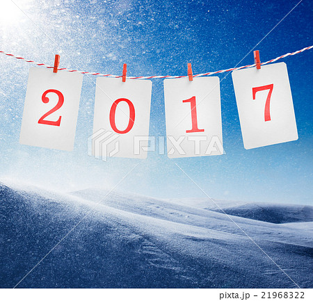 Paper or photo frames with 2017 numbers hanging on 21968322
