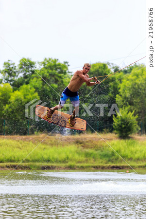 Man Wakeboarding. Jumping Man Wakeboarding. Jumping 21968766
