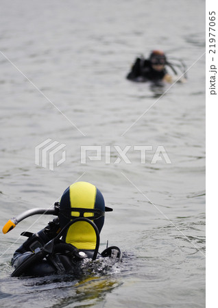 Lake divers on a surface 21977065